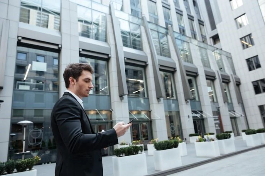 Commercial property refinance planning with calculator and financial documents for UK mortgage restructuring